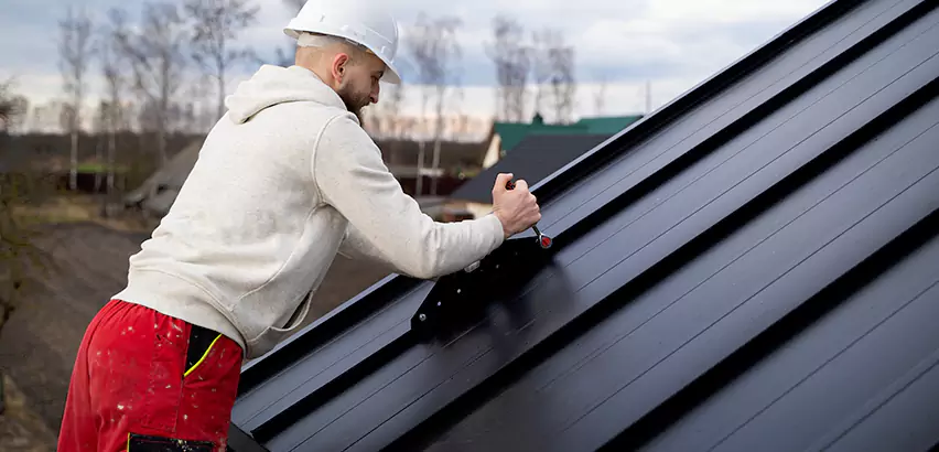 Tin Roof Ridge Cap Installation in Alpine